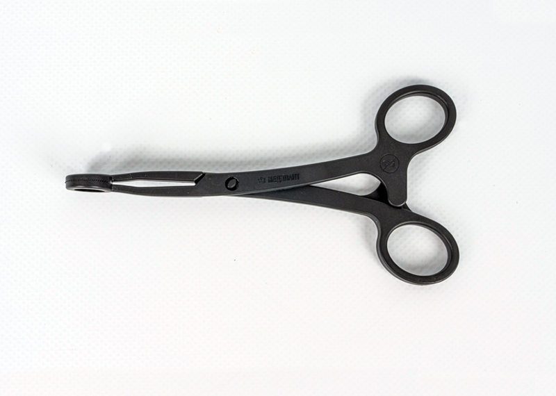 Disposable sterile tongue holder for adults